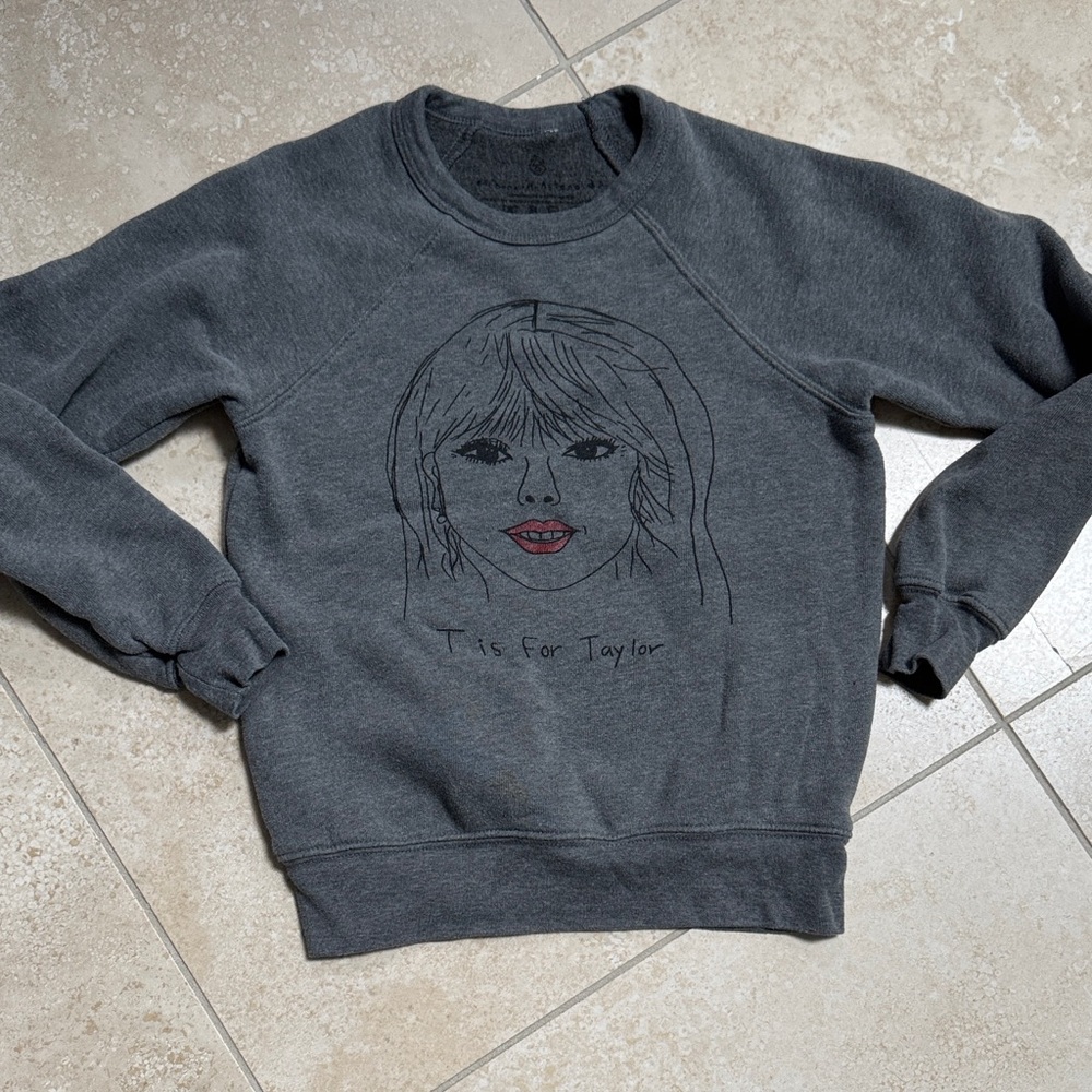 Taylor Gray Sweatshirt with Artistic Face Design
